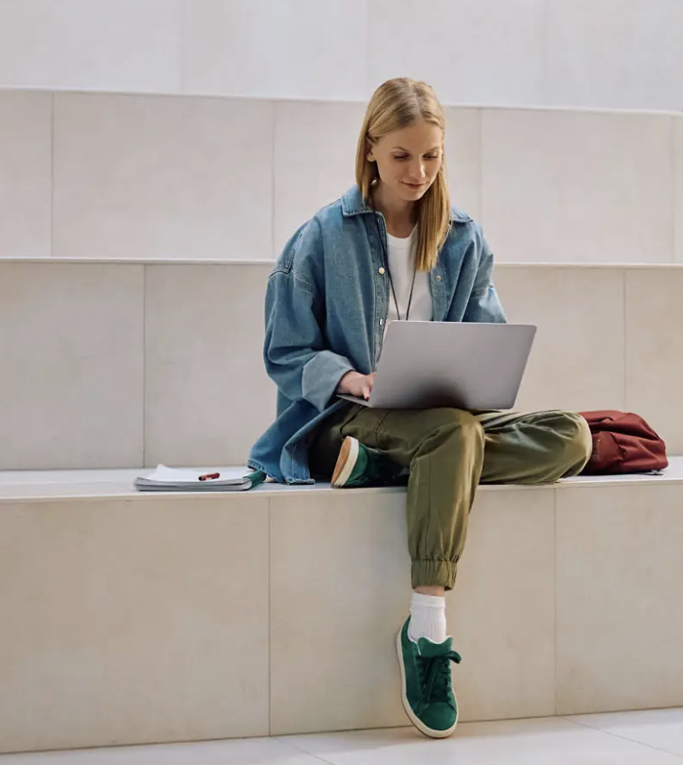 A student working alone between mentor sessions